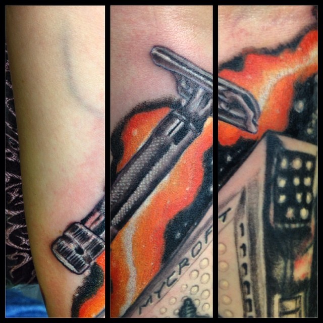 Continuing work on my wife's Heinlein sleeve. Today was the razor from Job: A Comedy of Justice