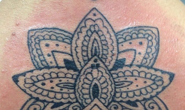 Lotus on back pt 2. Henna inspired
